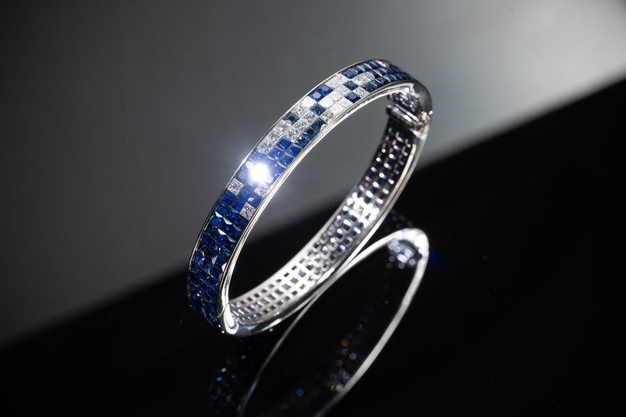 Mosaic pattern invisible setting of natural blue sapphire and diamond bangle